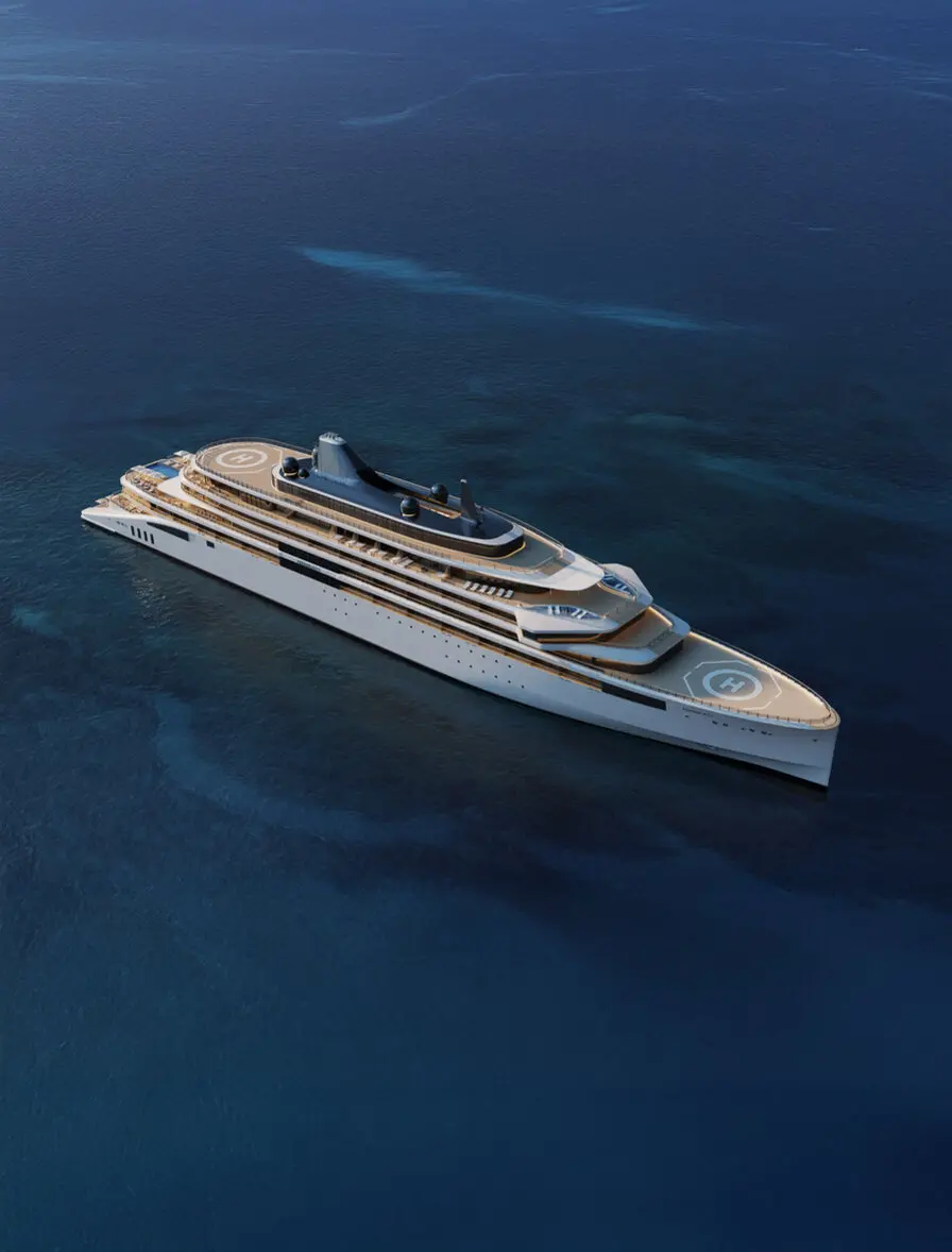 Aerial view of a large cruise ship on calm, deep blue ocean waters at Aman.