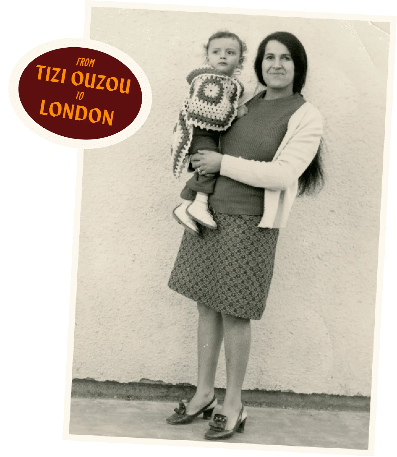 old photo of lebanese woman holding baby
