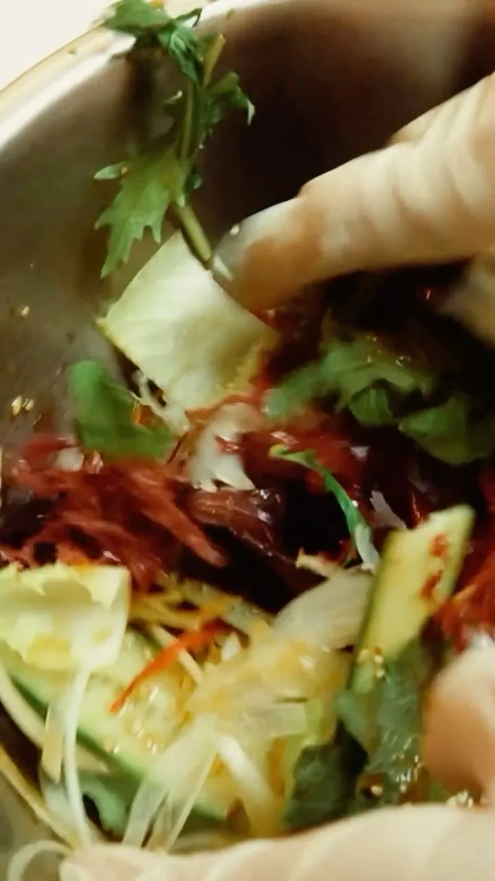 Seaweed Salada comes with mixed greens, red and white tosaka seaweed, onion, cucumber, shiso, sesame, lotus root, ponzu, and mustard.
Pro tip: add an order of sliced sashimi!