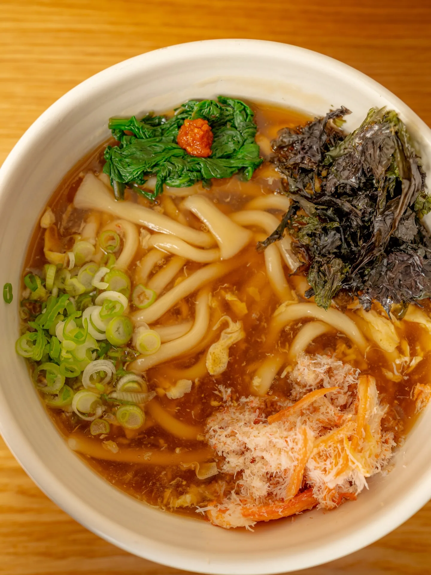 The Kani Ankake comes with yuzu kosho which gives the dish a new flavor profile with a little bit of heat.